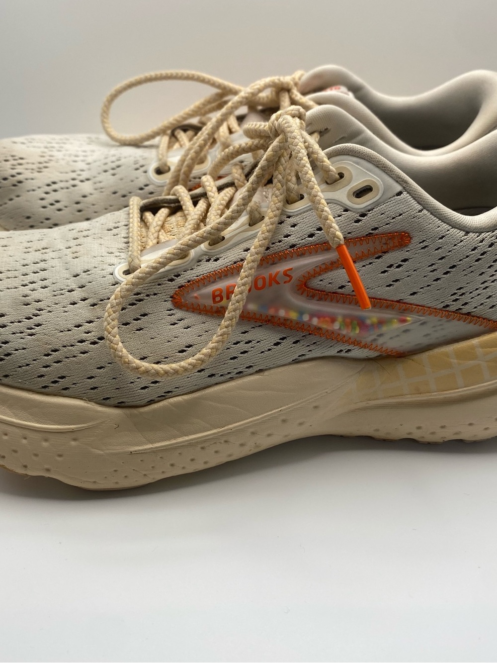 Brooks Cream Running Sneakers with Orange Logo Accent